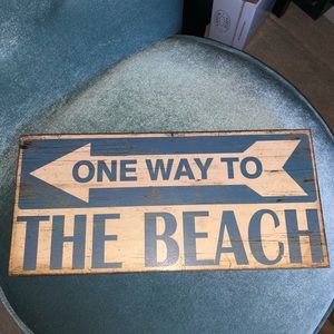 “One Way To The Beach” wall sign